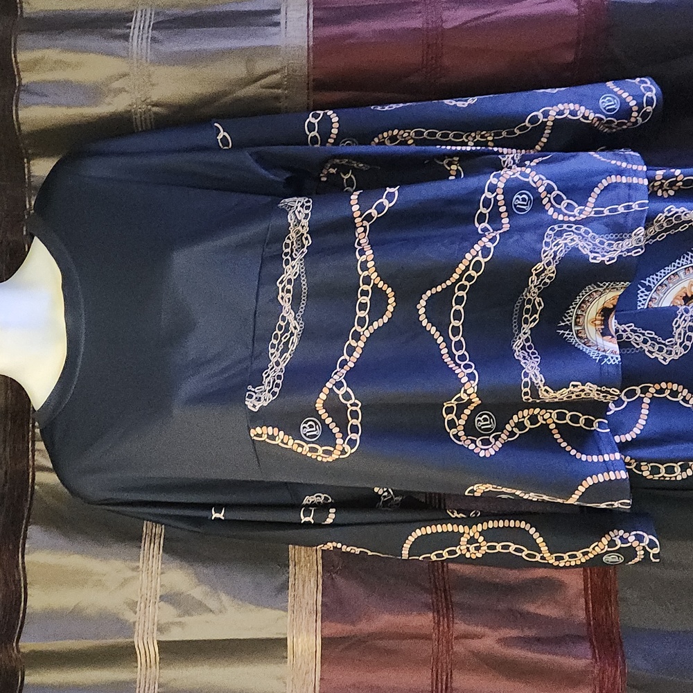 Womens chain link pants suit. Great condition.